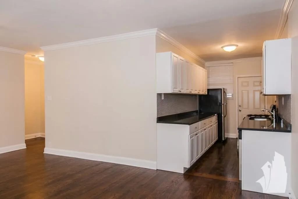 Renovated Studio apartment features hardwood floors, large living area, modern bath.